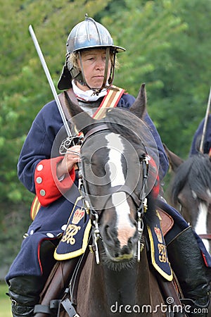 Military Tattoo COLCHESTER ESSEX UK 8 July 2014: Woman cavalry soldier Editorial Stock Photo