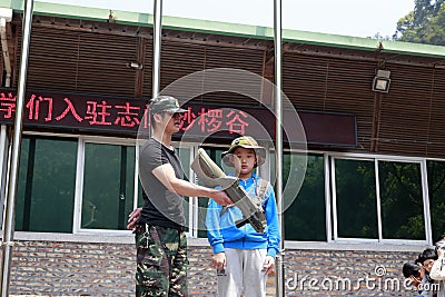 Military training of child Editorial Stock Photo