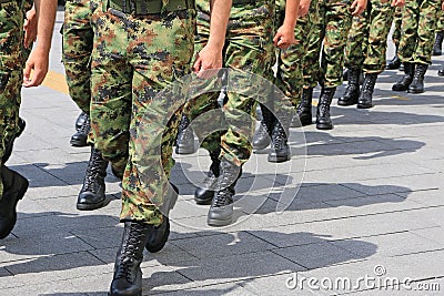 Military troop marching Stock Photo