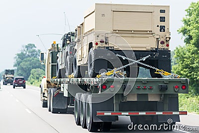 Military vehicles on the road Editorial Stock Photo