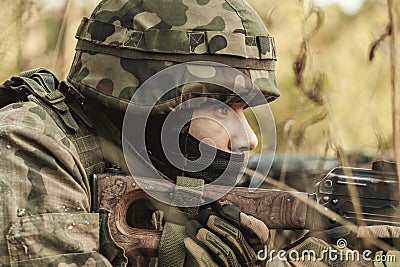 Military woman with a rifle Stock Photo