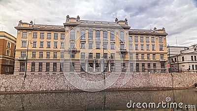 Miljacka river and post office in Sarajevo the capital city of Bosnia and Herzegovina timelapse hyperlapse. Cloudy sky stock footage Miljacka river and post office in Sarajevo the capital city of Bosnia and Herzegovina timelapse hyperlapse. Cloudy sky stock footage