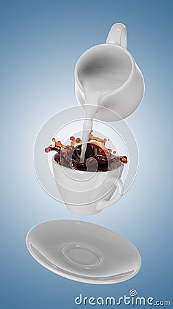 Milk being poured into small cup of coffee. 3d Stock Photo