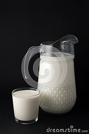 Milk on a black backgroud Stock Photo