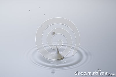 Milk drop splash Stock Photo