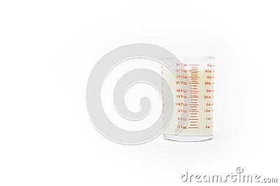 Milk in a measuring glass Stock Photo