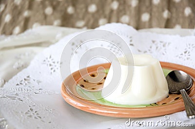 Milk pudding on plate Stock Photo