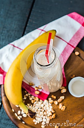 Milkshake with banana, oatmeal and peanut paste Stock Photo