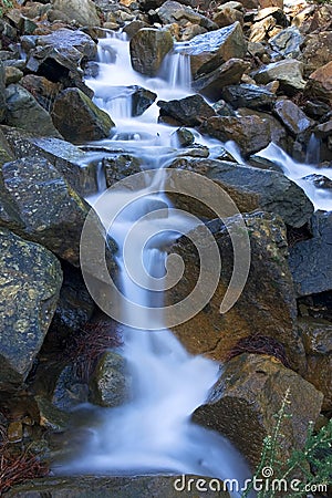 Milky waters of Spanish waterfall after rain Stock Photo