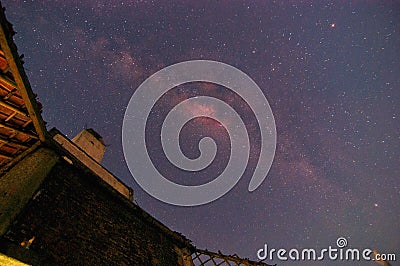 Milky way above old building in Kudus City, Central Java, Indonesia Stock Photo