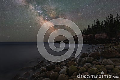 Milky Way Galaxy over Boulder Beach in Maine Stock Photo