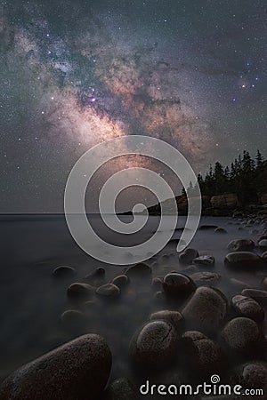 Milky Way Galaxy over Boulder Beach in Maine Stock Photo