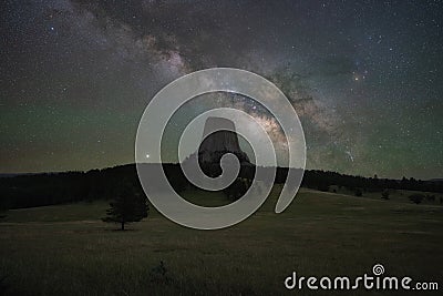 Milky Way Galaxy rising over Devils Tower in Wyoming Stock Photo