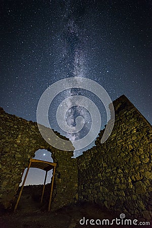 The Milky Way galaxy seen above the ruins of the Enisala citadel Stock Photo