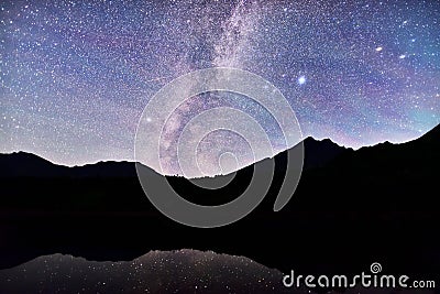 Milky Way over mountain lake in Styria Stock Photo