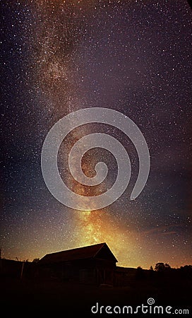 MILKY WAY over WOOD BARN Stock Photo