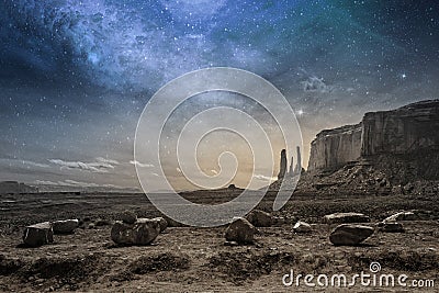 Milky way in a rocky desert landscape Stock Photo