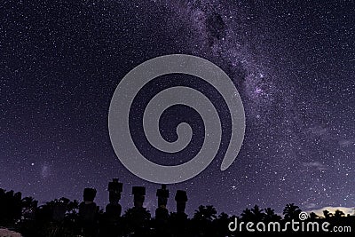 Milky Way Shows Above Moai On Easter Island, Chile Stock Photo