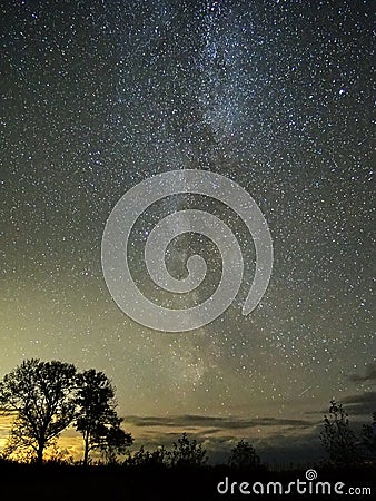 Milky way stars and clouds observing Ð°utumn landscape Stock Photo