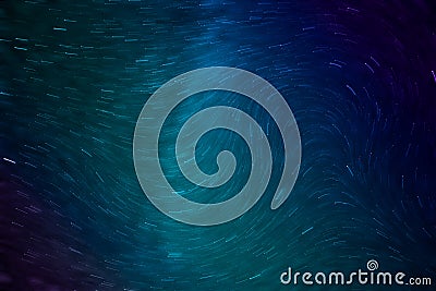 Milky way stars with waves motion blur in blue Stock Photo