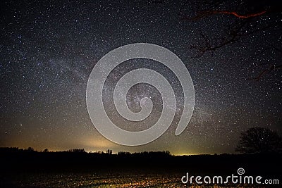 Milky way strars observing over latvian fields Stock Photo