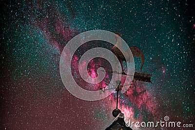 Milky Way, weather vane and stars Stock Photo