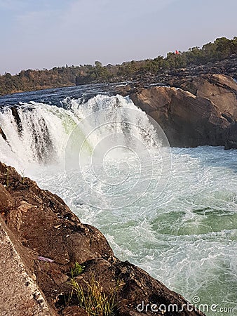 A milky white waterfall with beautiful sky Stock Photo