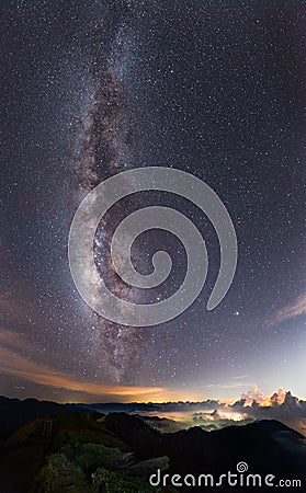 Milkyway above the colorful clouds in Taiwan sky from the top of He Huan Mountain Stock Photo