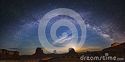 Milkyway over monument valley Stock Photo