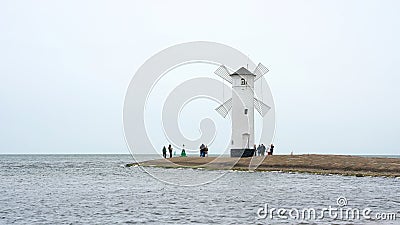 Mill beacon, the landmark of the city of Swinoujscie Editorial Stock Photo