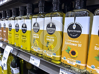 Mill Creek, WA USA - circa June 2022: Angled, selective focus on cooking oils for sale inside a Town and Country grocery store Editorial Stock Photo