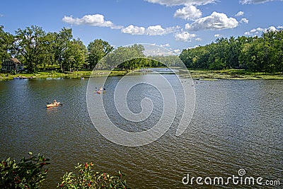 RiviÃ¨re des Mille ÃŽles - Thousand Islands River boats scene in Ste-Rose Laval Quebec Editorial Stock Photo