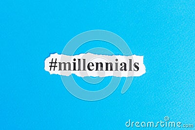 Millennials text on paper. Word Millennials on torn paper. Concept Image Stock Photo