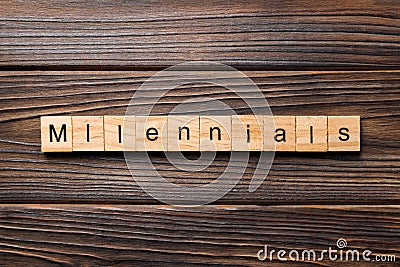 Millennials word written on wood block. millennials text on table, concept Stock Photo