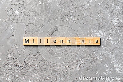 Millennials word written on wood block. millennials text on table, concept Stock Photo