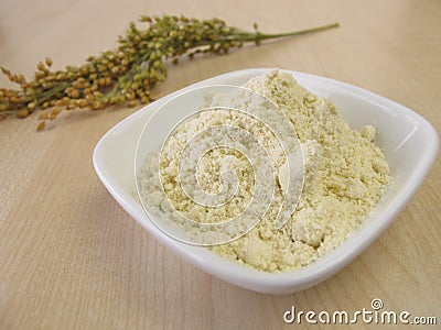 Millet flour and panicle millet Stock Photo