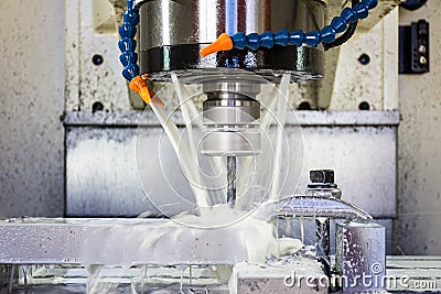 Milling metalworking process. Precision industrial CNC machining of metal detail by cutting mill Stock Photo