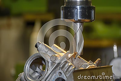 The milling process on NC milling machine with motorcycle cylinder head parts Stock Photo