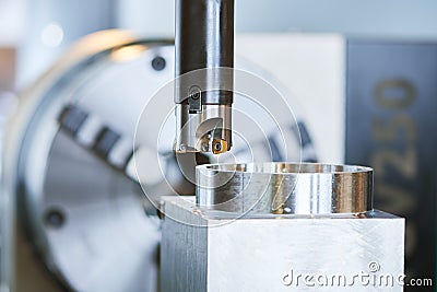 Milling process on precision CNC machine by vertical mill Stock Photo