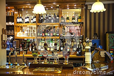 Miltre tavern, Classic english public house interior. Beer counter. Cambridge Editorial Stock Photo