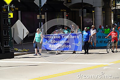 Wisconsin worker Labor Unions and Teamsters marched in the streets of Milwaukee during the Labor Day Holiday. Editorial Stock Photo