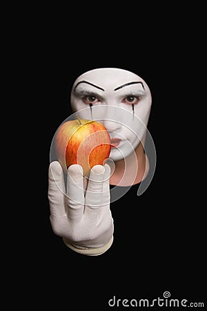 Mime with red apple Stock Photo