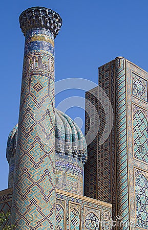 Minaret and dome, fragments of Sher-Dor madrasah in the architectural complex Registan, Samarkand Stock Photo