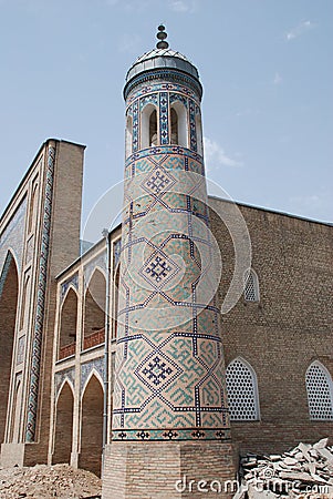 Minaret of madrasa Kukaldosh Stock Photo