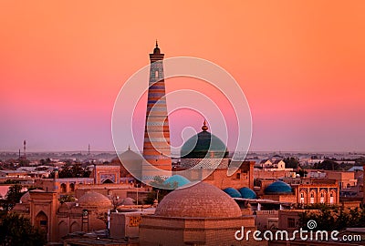 Minaret and madrasah of Islam-Khoja in the old Khiva Stock Photo
