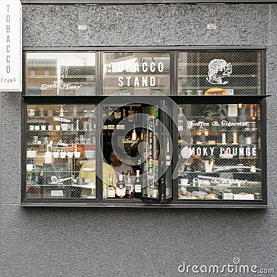 Minato, Tokyo, Japan - Small tobacco stand selling coffee, whiskey, and cigarette. Editorial Stock Photo