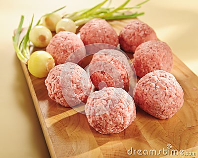 Minced delicatessen meat on a cutting board. Stock Photo