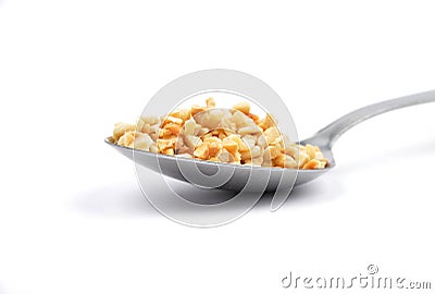 Minced hazelnuts on spoon Stock Photo