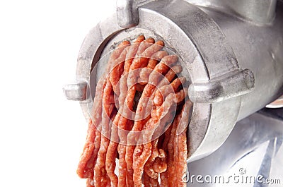 Minced meat comes fresh from a mincer Stock Photo