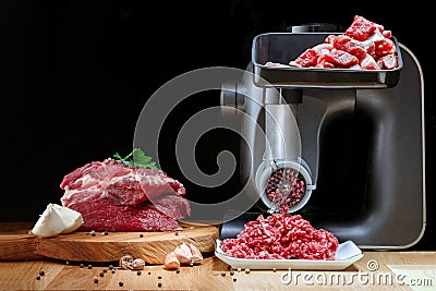 Mincer electric with fresh minced meat. Stock Photo